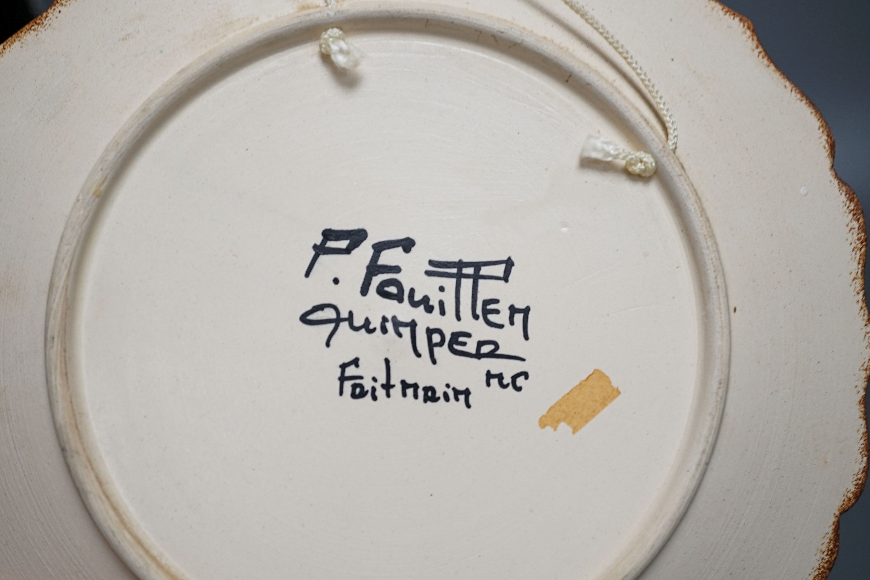 A Quimper dish, 28.5 cm and a dish by Paul Fouillen, and a Quimper dish by Maurice Fouillen